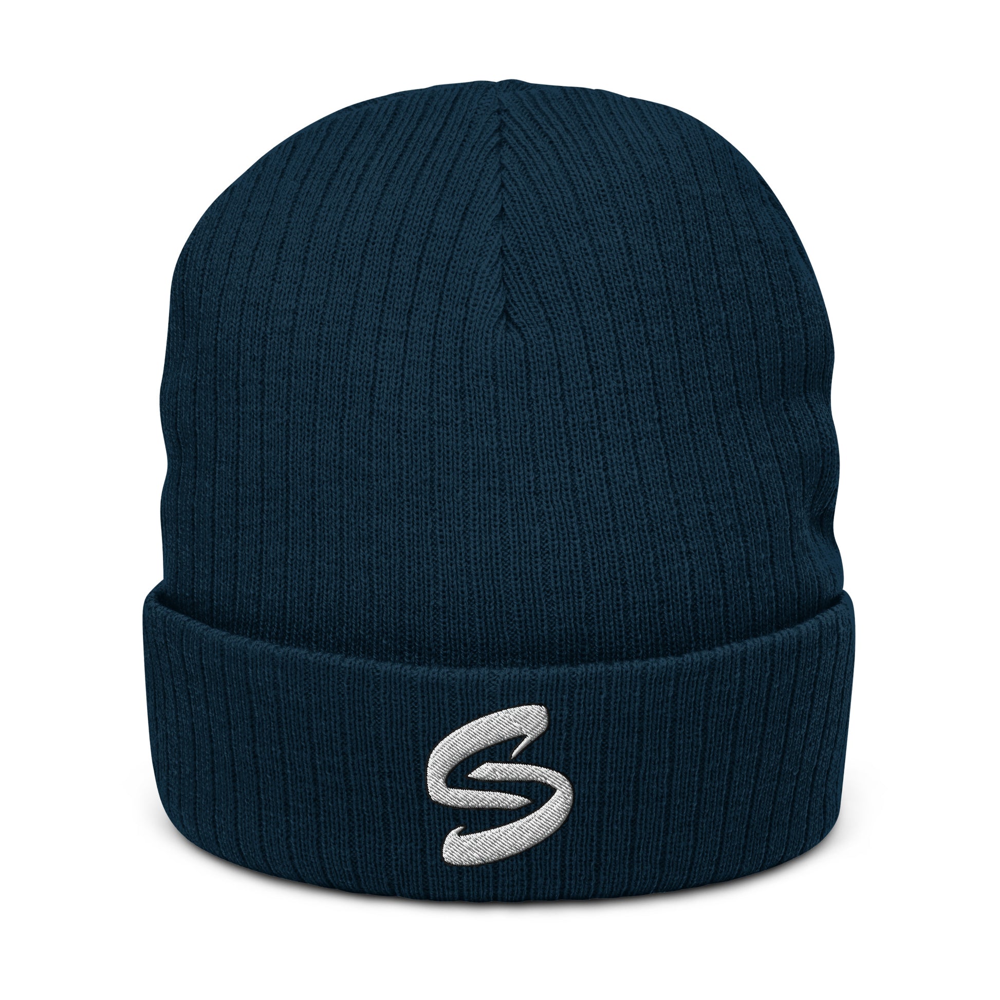 Ribbed knit beanie in recycled polyester and acrylic blend, double-layered with a cuffed design. Stylish, warm, and versatile accessory for all head sizes. Handcrafted on demand to reduce overproduction and promote sustainable choices. 8.27 inches (21 cm) in length. Beanie in Navy Blue with embroidered White Send Coalition S logo